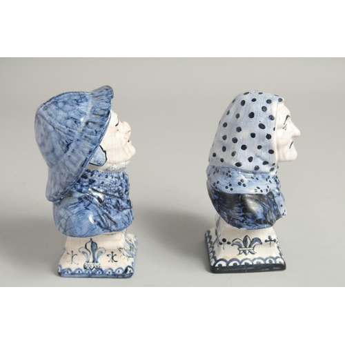 1198 - A SMALL PAIR OF DUTCH BLUE AND WHITE BUSTS OF A MAN AND WOMAN. 6ins high