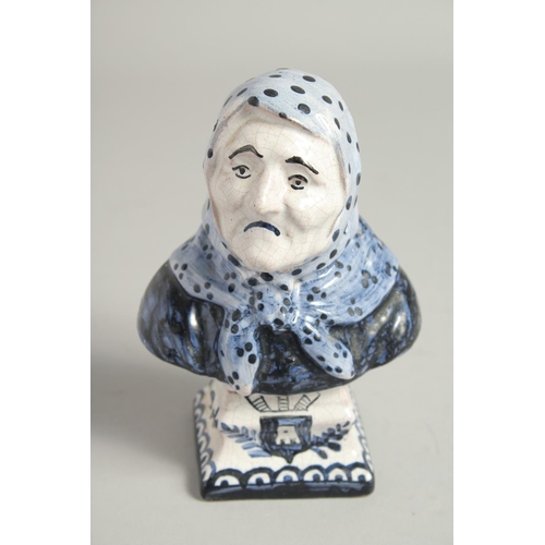 1198 - A SMALL PAIR OF DUTCH BLUE AND WHITE BUSTS OF A MAN AND WOMAN. 6ins high