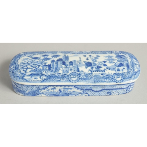 1215 - A BLUE AND WHITE POTTERY BOX AND COVER. 6.5ins long.