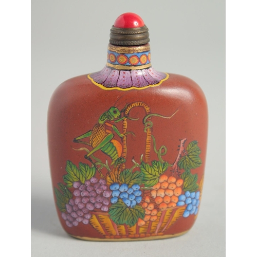 1239 - A CHINESE LACQUER SNUFF BOTTLE with flowers. 7cm