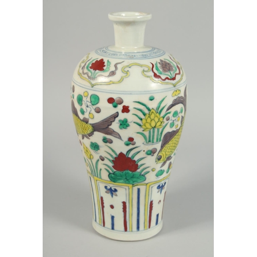 1249 - A CHINESE VASE decorated with fish. 14ins high.