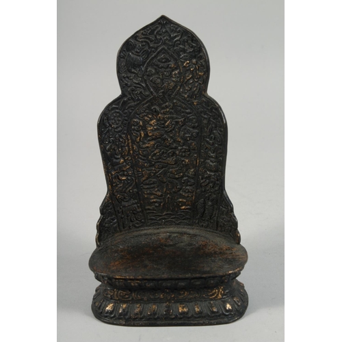 1254 - A BRONZE FIGURE OF SEATED BUDDHA, rested on a detachable base.  22cm high overall.