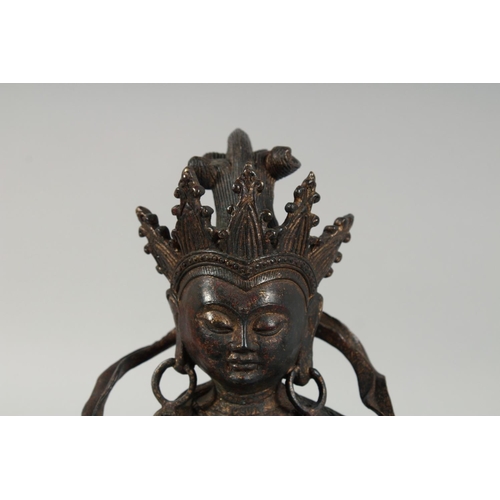 1255 - A LARGE BRONZE FIGURE OF A SEATED DEITY, sat upon a bird and on a lotus base, with traces of gilt, 2... 