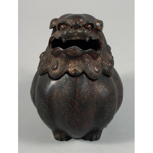 1256 - A CHINESE BRONZE BULBOUS LION DOG LIDDED CENSER, with traces of gilt and red paint, the head as a de... 