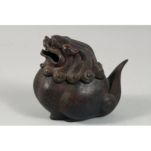 1256 - A CHINESE BRONZE BULBOUS LION DOG LIDDED CENSER, with traces of gilt and red paint, the head as a de... 