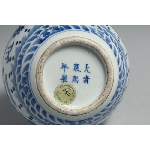 1260 - A CHINESE BLUE AND WHITE PORCELAIN BOTTLE VASE, painted with dragons and the flaming pearl of wisdom... 