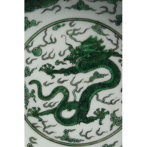 1263 - A CHINESE FAMILLE VERTE PORCELAIN DISH, decorated with dragons and the flaming pearl of wisdom among... 