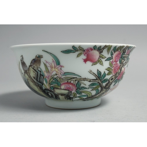 1265 - A CHINESE FAMILLE ROSE PORCELAIN BOWL, painted with pomegranate blossom and birds, the base with fou... 