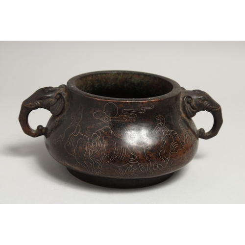 1268 - A GOOD CHINESE CIRCULAR BRONZE TWO HANDLED CENSER with elephant handles and inlaid with silver. 6.5i... 