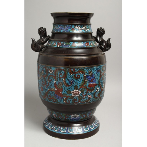 1269 - A LARGE CHINESE BRONZE AND CLOISONNE ENAMEL VASE with lion handles. 15ins high.