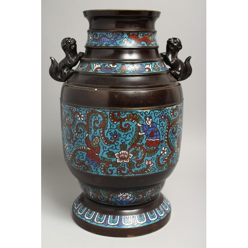 1269 - A LARGE CHINESE BRONZE AND CLOISONNE ENAMEL VASE with lion handles. 15ins high.