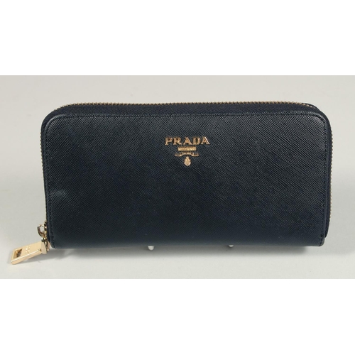 1539 - A PRADA BLACK LEATHER PURSE 7ins x 3.5ins.