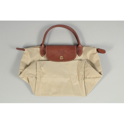 1542 - A LONGCHAMP BAG with two handles.