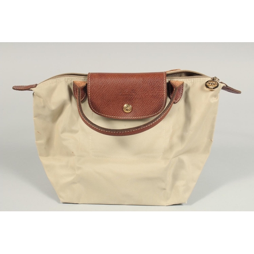 1542 - A LONGCHAMP BAG with two handles.