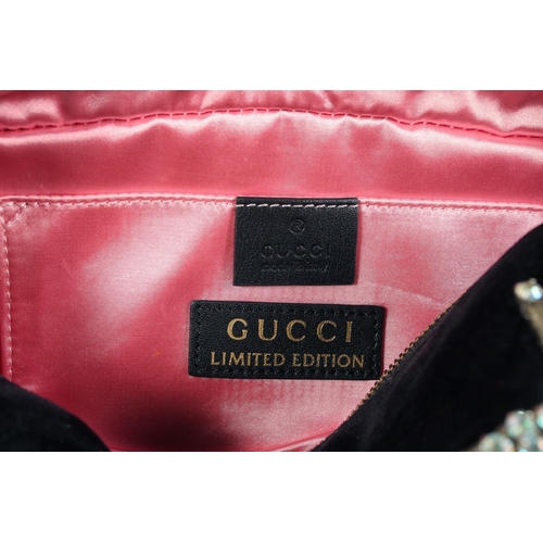 1546 - A GUCCI BLACK VELVET LTD. EDITION STAR BAG. 9.5ins x 5ins with a double 'G' and six coloured stars, ... 