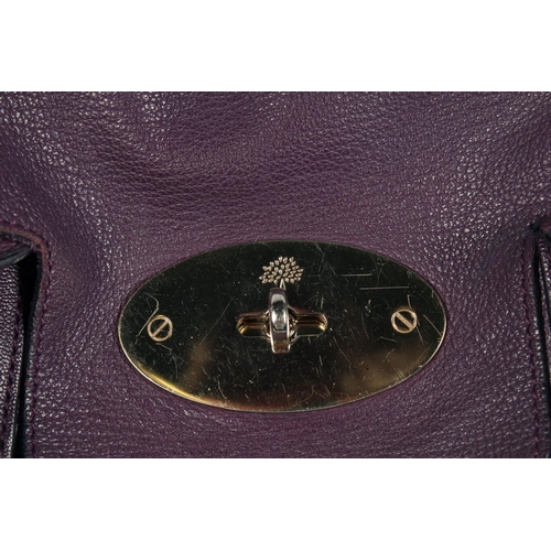 1548 - A LARGE MULBERRY MAUVE SOFT LEATHER BAG. 14ins x 10.5ins with two leather handles.