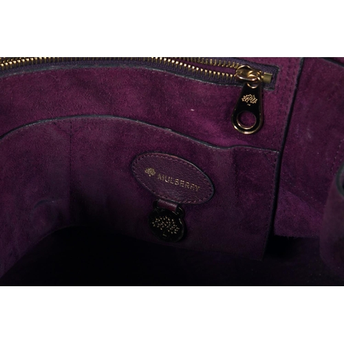 1548 - A LARGE MULBERRY MAUVE SOFT LEATHER BAG. 14ins x 10.5ins with two leather handles.