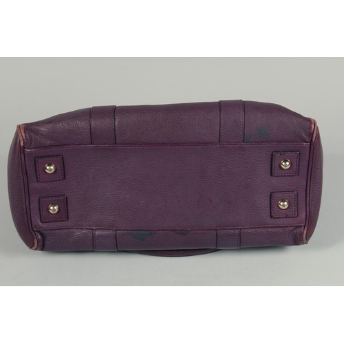 1548 - A LARGE MULBERRY MAUVE SOFT LEATHER BAG. 14ins x 10.5ins with two leather handles.