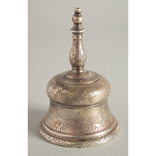 1909 - A CONTINENTAL SILVER TABLE BELL, mark struck on finial, with a cross. 3.5ins high.