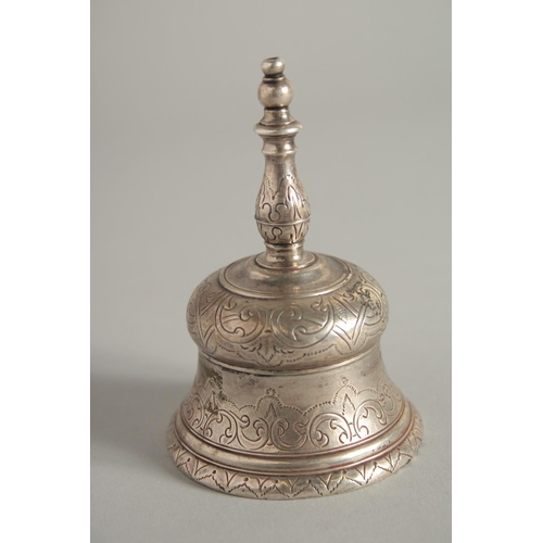 1909 - A CONTINENTAL SILVER TABLE BELL, mark struck on finial, with a cross. 3.5ins high.