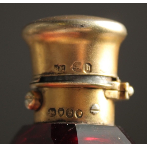 1913 - A VICTORIAN RUBY GLASS SILVER MOUNTED FLASK VINAIGRETTE. 3.5ins long. London 1863