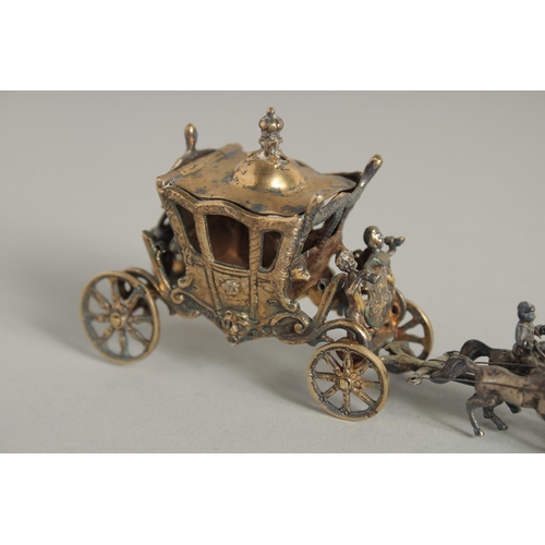 1916 - A CONTINENTAL SILVER GILT CORONATION COACH AND HORSES. 7ins long