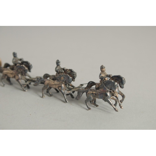 1916 - A CONTINENTAL SILVER GILT CORONATION COACH AND HORSES. 7ins long