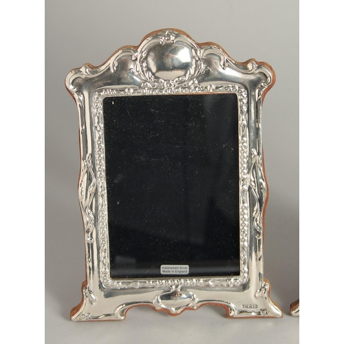 1918 - A PAIR OF SILVER PHOTOGRAPH FRAMES 7ins high.