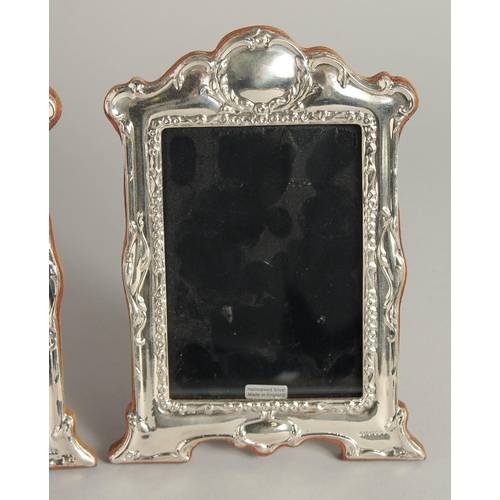 1918 - A PAIR OF SILVER PHOTOGRAPH FRAMES 7ins high.