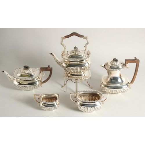 1920 - A GOOD SILVER FIVE PIECE TEA SET with spirit kettle and stand, tea pot, hot water jug, sugar basin a... 