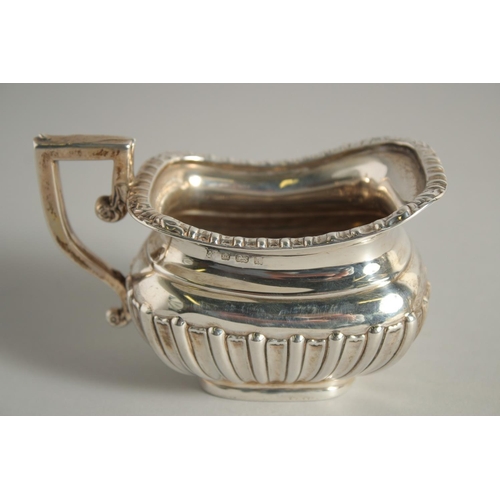 1920 - A GOOD SILVER FIVE PIECE TEA SET with spirit kettle and stand, tea pot, hot water jug, sugar basin a... 