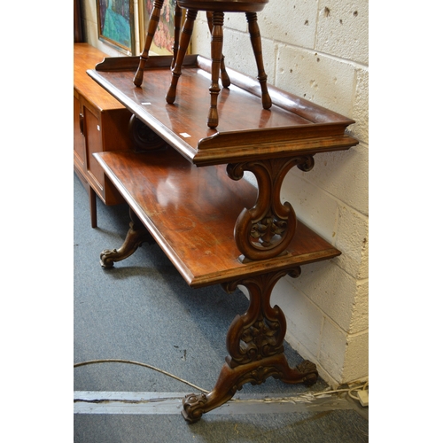 1061 - A GOOD VICTORIAN MAHOGANY TWO TIER BUFFET with carved and pierced end supports. 48ins long x 41ins h... 