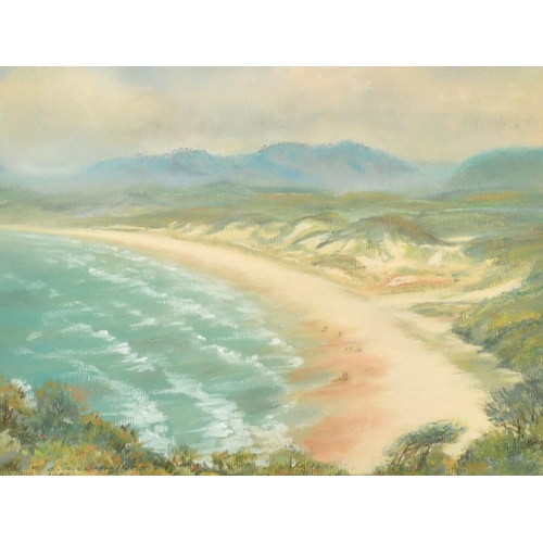 123 - C.G Cummings (20th Century) An extensive beach scene with mountains beyond, pastel, signed and dated... 