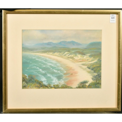 123 - C.G Cummings (20th Century) An extensive beach scene with mountains beyond, pastel, signed and dated... 