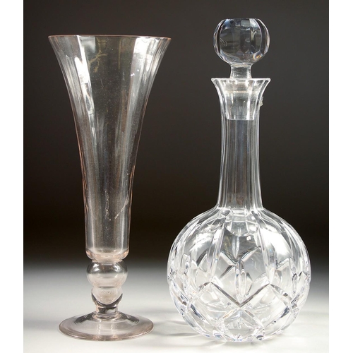 1088 - A CUT GLASS PORT DECANTER AND STOPPER and a TULIP GLASS VASE. (2).