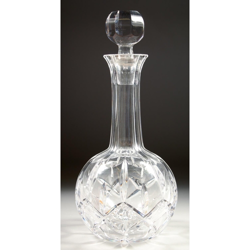 1088 - A CUT GLASS PORT DECANTER AND STOPPER and a TULIP GLASS VASE. (2).