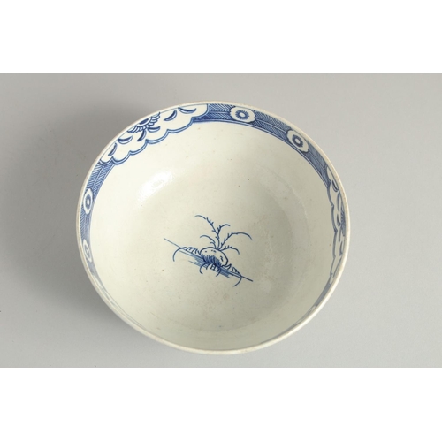 1103 - AN 18TH CENTURY WORCESTER BOWL painted with the uncommon Late Rock Floral pattern, crescent mark.