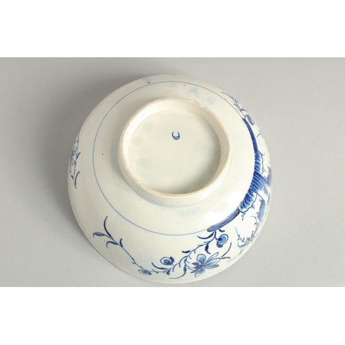 1103 - AN 18TH CENTURY WORCESTER BOWL painted with the uncommon Late Rock Floral pattern, crescent mark.