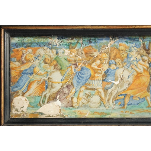 1127 - AN EARLY MAJOLICA PLAQUE, POSSIBLY 15-16TH CENTURY. A battle scene 7ins x 18ins frame.