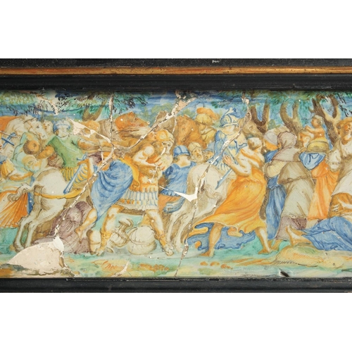 1127 - AN EARLY MAJOLICA PLAQUE, POSSIBLY 15-16TH CENTURY. A battle scene 7ins x 18ins frame.