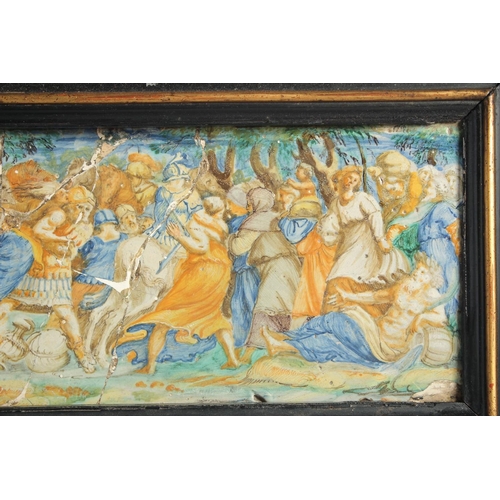 1127 - AN EARLY MAJOLICA PLAQUE, POSSIBLY 15-16TH CENTURY. A battle scene 7ins x 18ins frame.