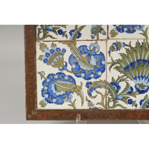 1134 - A SET OF FOUR SQUARE PORCELAIN TILES, each 6ins square, possibly WILLIAM DE MORGAN, all four set in ... 