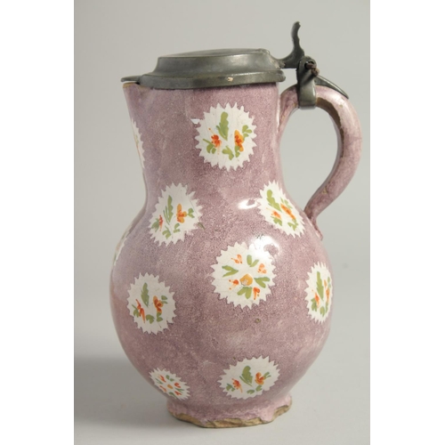 1148 - A GOOD LARGE 18TH CENTURY DUTCH FAIENCE JUG with pewter lid. 9ins high.