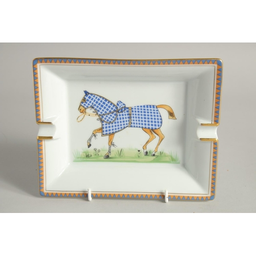 1177 - TWO HERMES OF PARIS PORCELAIN ASH TRAYS painted with horses. 7.5ins x 6ins.