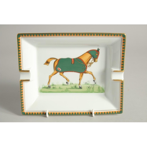 1177 - TWO HERMES OF PARIS PORCELAIN ASH TRAYS painted with horses. 7.5ins x 6ins.