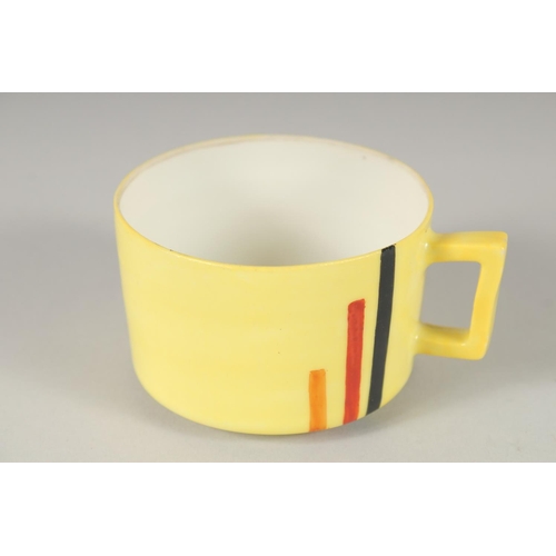 1183 - AN ART DECO YELLOW TEA SET, comprising large tea pot, small tea pot, sugar bowl, six cups and saucer... 