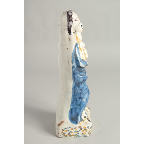 1184 - AN 18TH CENTURY FIANCE POTTERY FIGURE, Madonna and child. 12ins high.