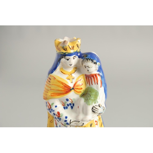 1185 - A FIANCE POTTERY FIGURE 