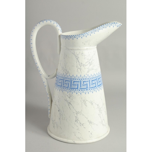 1188 - A LARGE LUNEVILLE POTTERY JUG with blue pattern. 15ins high.