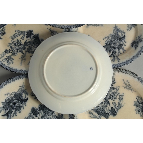 1189 - A SET OF SIXTEEN FLOW BLUE DINNER PLATES. 9ins diameter.